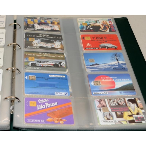 177 - Very large collection of phone cards contained within 2 albums. 100's of cards well worth a sort thr... 