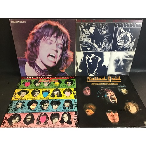 404 - 10 ROLLING STONES VINYL LP RECORDS. TITLES HERE INCLUDE - Steel Wheels - Rewind - Rolled Gold x 2 - ... 