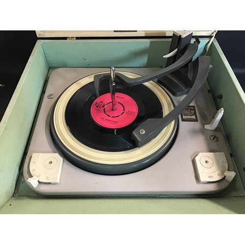 543 - PORTABLE BERMUDA DANSETTE RECORD PLAYER. This unit houses an automatic changer turntable with update... 