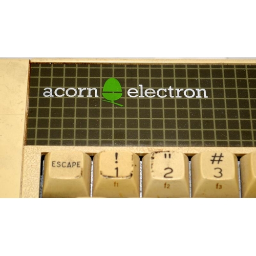 237 - Vintage computing: 1982 Acorn Electron home computer c/w power lead. Offered untested