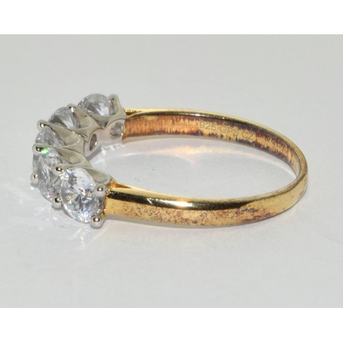 408 - A gold on 925 silver and CZ five stone ring Size R