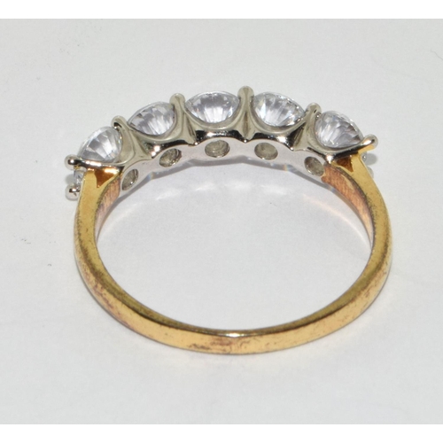 408 - A gold on 925 silver and CZ five stone ring Size R