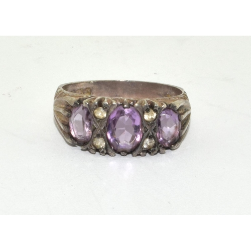 401 - A sterling silver and amethyst ring, fully hallmarked and size P