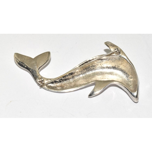 396 - A large heavy weigh solid 925 silver dolphin brooch.