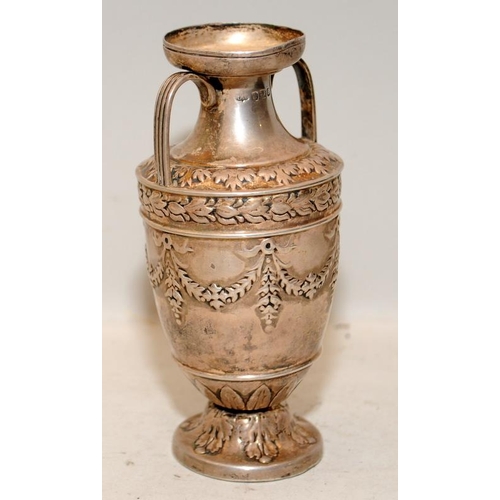 352 - Hallmarked silver twin handled urn 13.5cms tall. Hallmarked for Sheffield 1897. total weight 284g wi... 