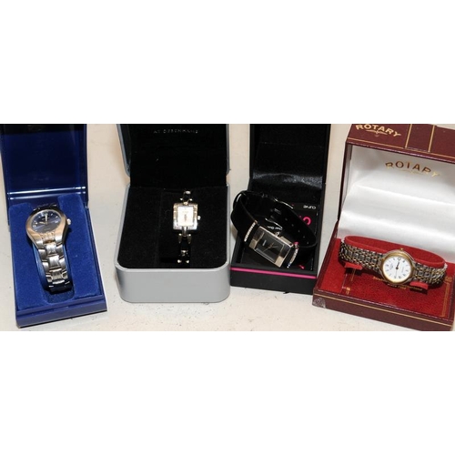 347 - Collection of boxed ladies fashion watches