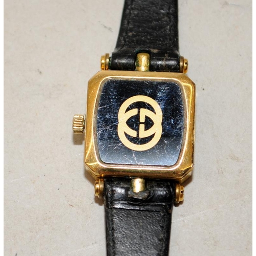 297 - Ladies Gucci quartz watch ref: 4.86. Black dial square cushion case. Untested, requires new battery ... 