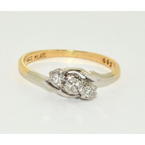 252 - 18ct gold ladies 3 stone Diamond  twist ring size M