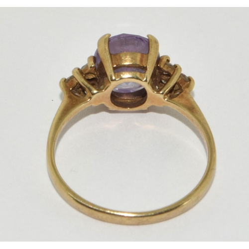 301 - 9ct gold ladies Amethyst ring size O