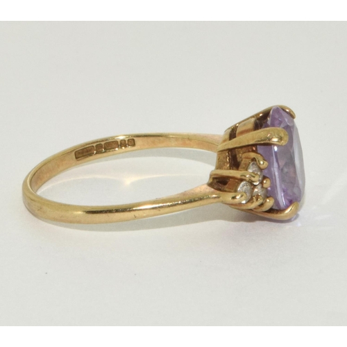 301 - 9ct gold ladies Amethyst ring size O