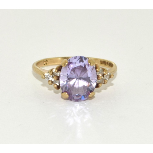 301 - 9ct gold ladies Amethyst ring size O