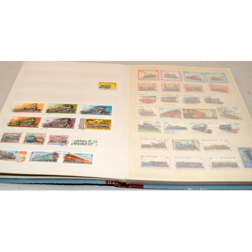 189 - Two albums of world stamps, one on the subject of trains and the other on insects and plants