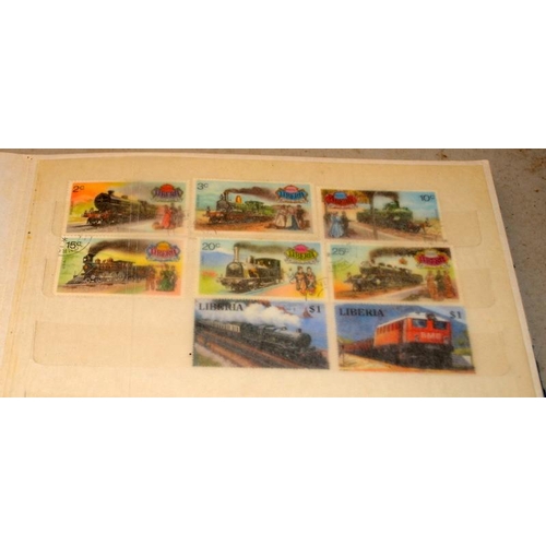 189 - Two albums of world stamps, one on the subject of trains and the other on insects and plants