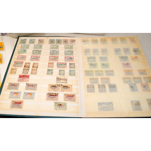 190 - Five stamp albums, two with a good selection of world stamps including early examples, an album of D... 