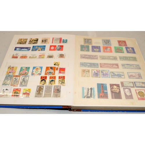 190 - Five stamp albums, two with a good selection of world stamps including early examples, an album of D... 