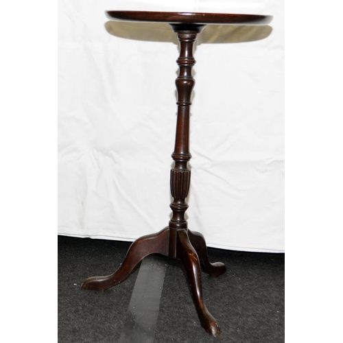 241 - Antique mahogany wine table on tripod base. 71cms tall x 38.5 across top