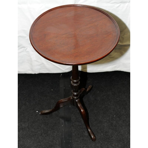 241 - Antique mahogany wine table on tripod base. 71cms tall x 38.5 across top