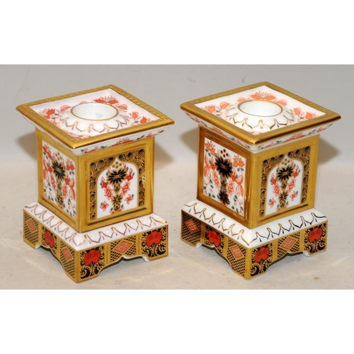 216 - Royal Crown Derby Imari pair of candle columns. 10cms tall