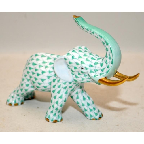 217 - Herend porcelain green fishnet elephant with 24ct gilded accents. 12.5cms across