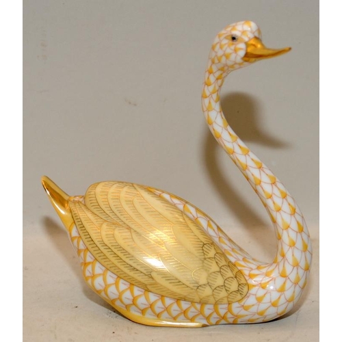 220 - Herend porcelain yellow fishnet swan with 24ct gold accents. 13cms tall