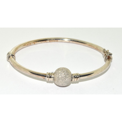 382 - 925 silver bangle set with a glitter ball charm