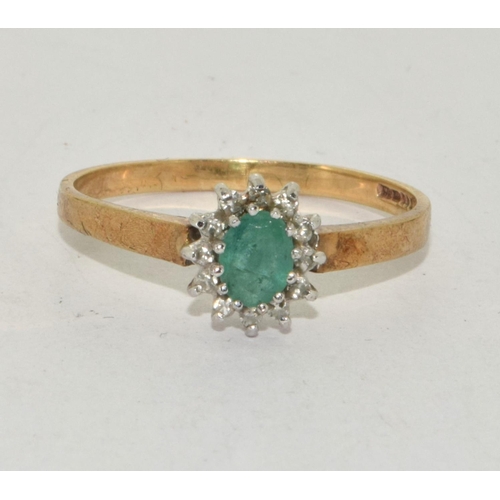 346 - 9ct gold ladies Emerald and Diamond cluster ring H/M dia size T