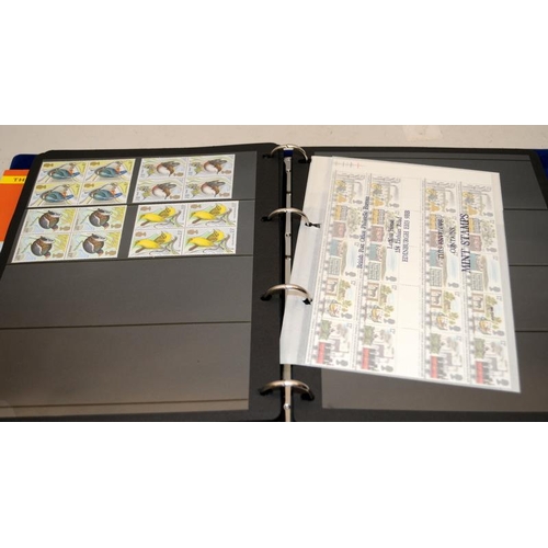 201 - A collection of mint GB stamps including a stock book, loose and framed examples. Includes high valu... 