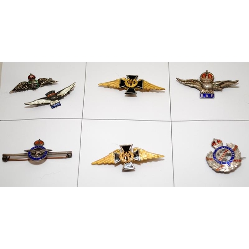 123A - A collection of vintage military sweetheart brooches