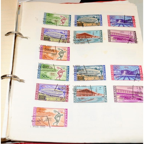 200A - A large collection of world stamps contained within a number of albums and stock books including ear... 