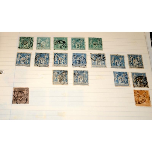 200A - A large collection of world stamps contained within a number of albums and stock books including ear... 