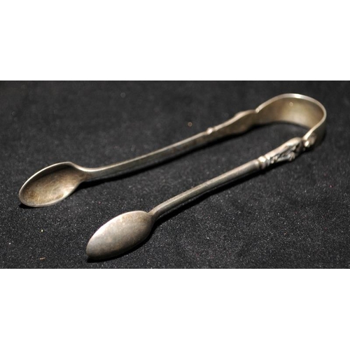 330 - Three pieces of Hallmarked Sheffield sterling silver. Two large teaspoons and a pair of sugar tongs.... 