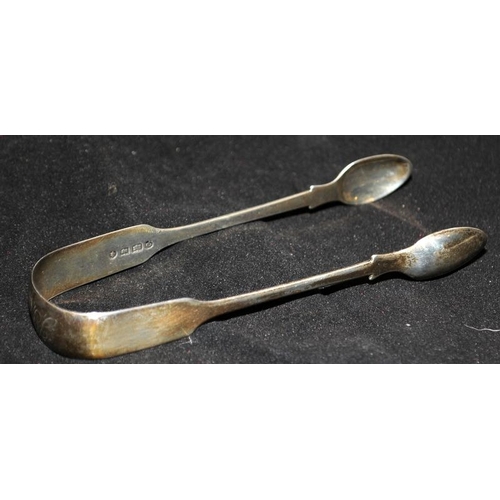 335 - Two pairs of Exeter hallmarked silver sugar tongs, Georgian and Victorian. Assayed 1806 and 1841. 60... 