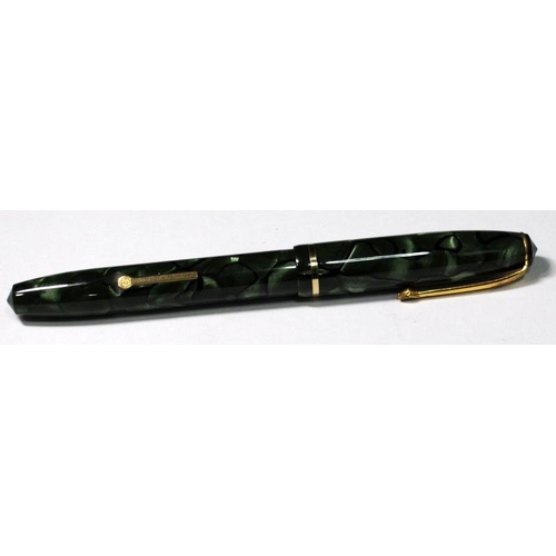 21 - Conway Stewart No.15 fountain pen. Black lined green and pearl marble body. Near mint. (Ref:EW130)