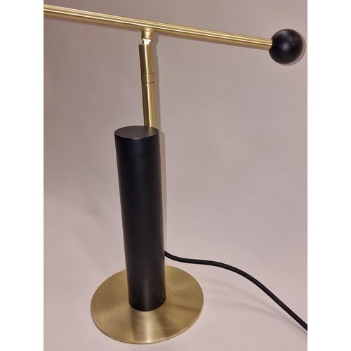 71 - Contemporary stylish design adjustable table lamp.