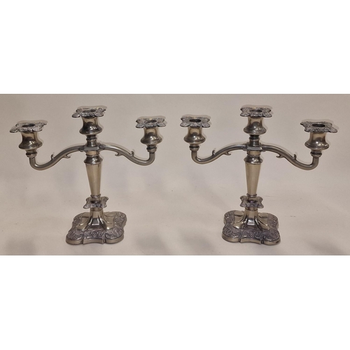 212 - Pair of silver plated two arm candelabras.