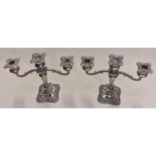 212 - Pair of silver plated two arm candelabras.