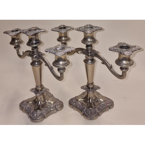 212 - Pair of silver plated two arm candelabras.