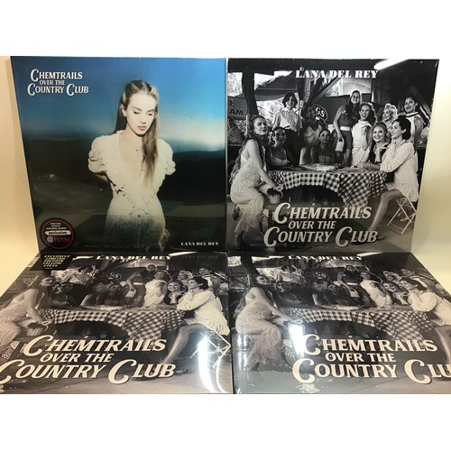 244 - LANA DEL REY VINYL FACTORY SEALED ALBUMS X 4. Three copies of ‘Chemtrails Over The Country Club’ fou... 