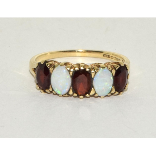 148 - Opal/Garnet 9ct Gold Ring Size Q 3.0g