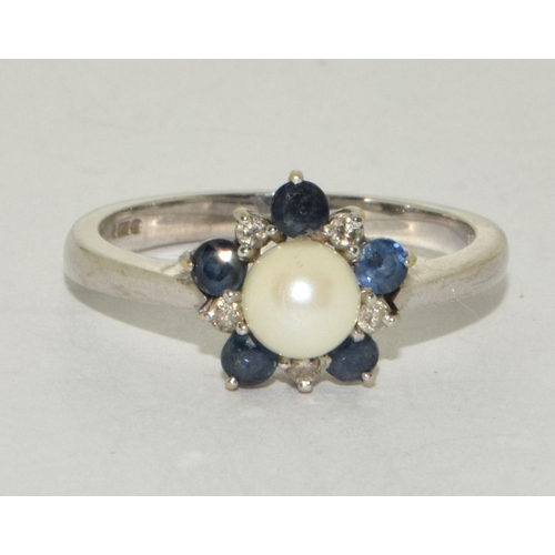 181 - 9ct White Gold Ladies Sapphire, Diamond & Pearl Ring. Size O