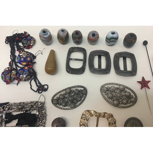 159 - A box containing antique shoe buckles, trade beads and miscellaneous items.