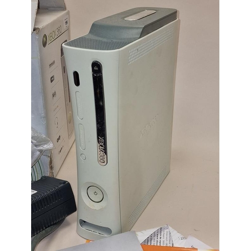 86 - Miscrosoft Xbox 360 boxed games console.