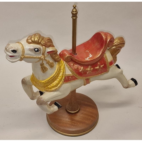 58 - An attractive large ceramic carousel horse ornament on wooden pole and base 37cm tall.