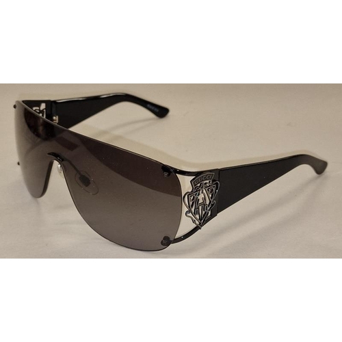 95 - A pair of ladies designer sunglasses with case and cleaning cloth.