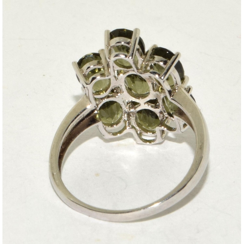 239 - A 925 silver and peridot large flower ring Size S