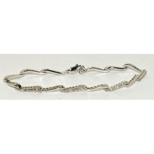 232 - 925 silver and sapphire set wave bracelet