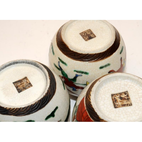 48 - Five Chinese crackled glaze jars, two covers and a tall vase.