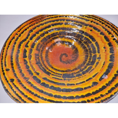 37 - Very large orange and black striped pattern 55cm diameter charger (examine) together with a small bo... 