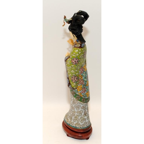 55 - Oriental Geisha lady figure in traditional dress 
on wooden stand 27cm tall