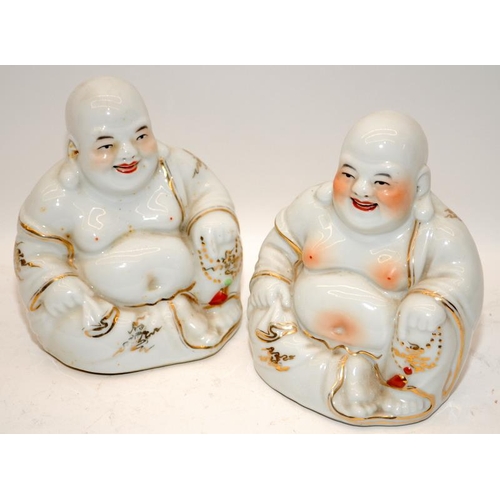 57 - A pair of Chinese porcelain blanc de chine Buddhas with gilt decoration (H14cm) and a figure of Kwan... 